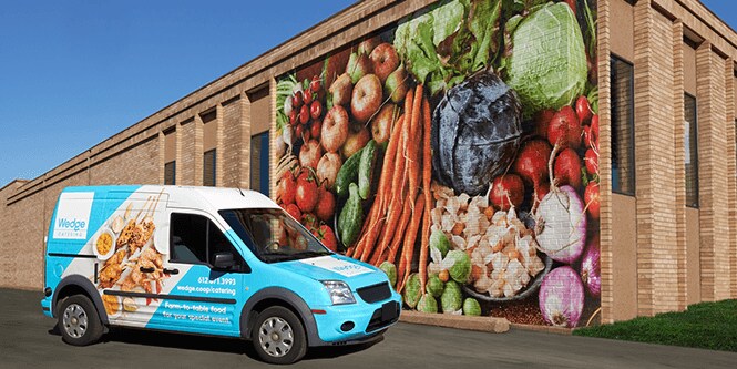 Light blue vehicle with Envision Print Wrap Film lx480mc
