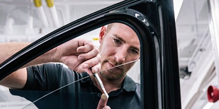 Man applying window tint
