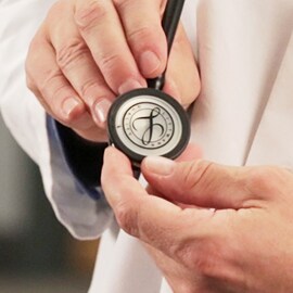 Chestpiece of a 3M Littmann Stethoscope with the Littmann seal on the diaphragm.