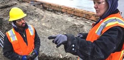 A 3M representative provides support and on-site training to a worker.
