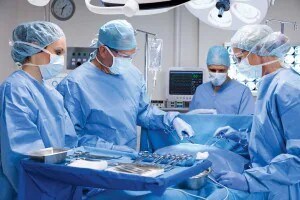 A surgical team performs surgery in an operating room

