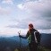 Backpacker overlooking mountainous landscape