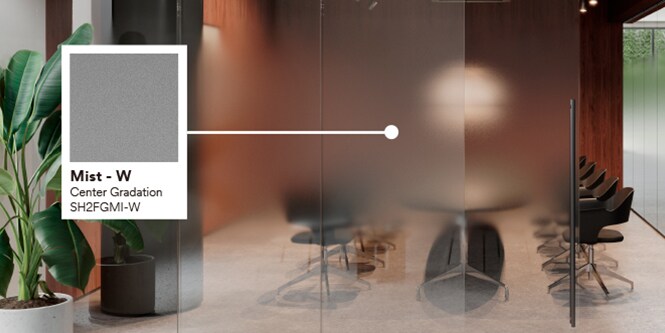 Image of modern office conference room featuring warm colors, stone floors and greenery with product callout of Mist glass finish.
