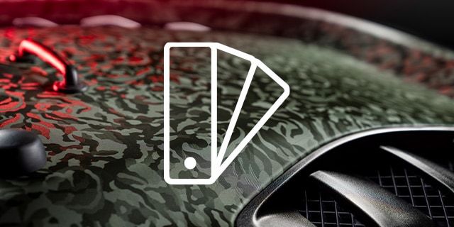 Detail shot of camo pattern wrap film on hood with swatch icon
