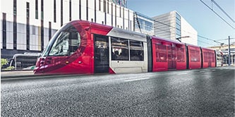 Modern train black and red graphic wrap in train station
