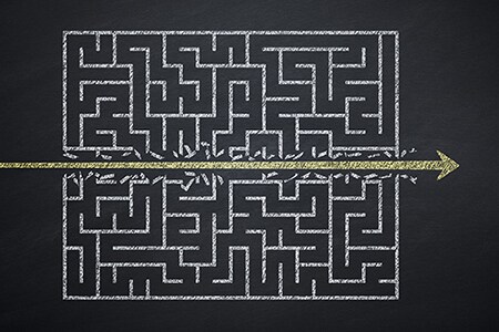 labyrinth divided by an golden arrow
