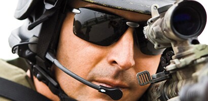 Military man wearing personal protective equipment
