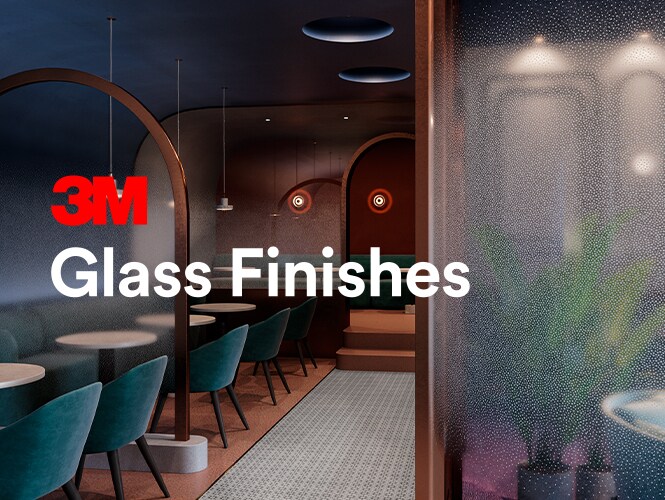 Interior of upscale restaurant dining interior decorated in jewel tones with glass dividers finished with 3M Glass Finish in a gradated dot pattern.

